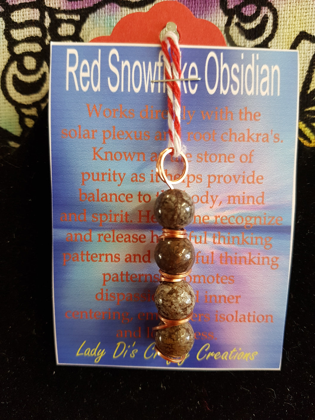 Red Snowflake Obsidian Pendant