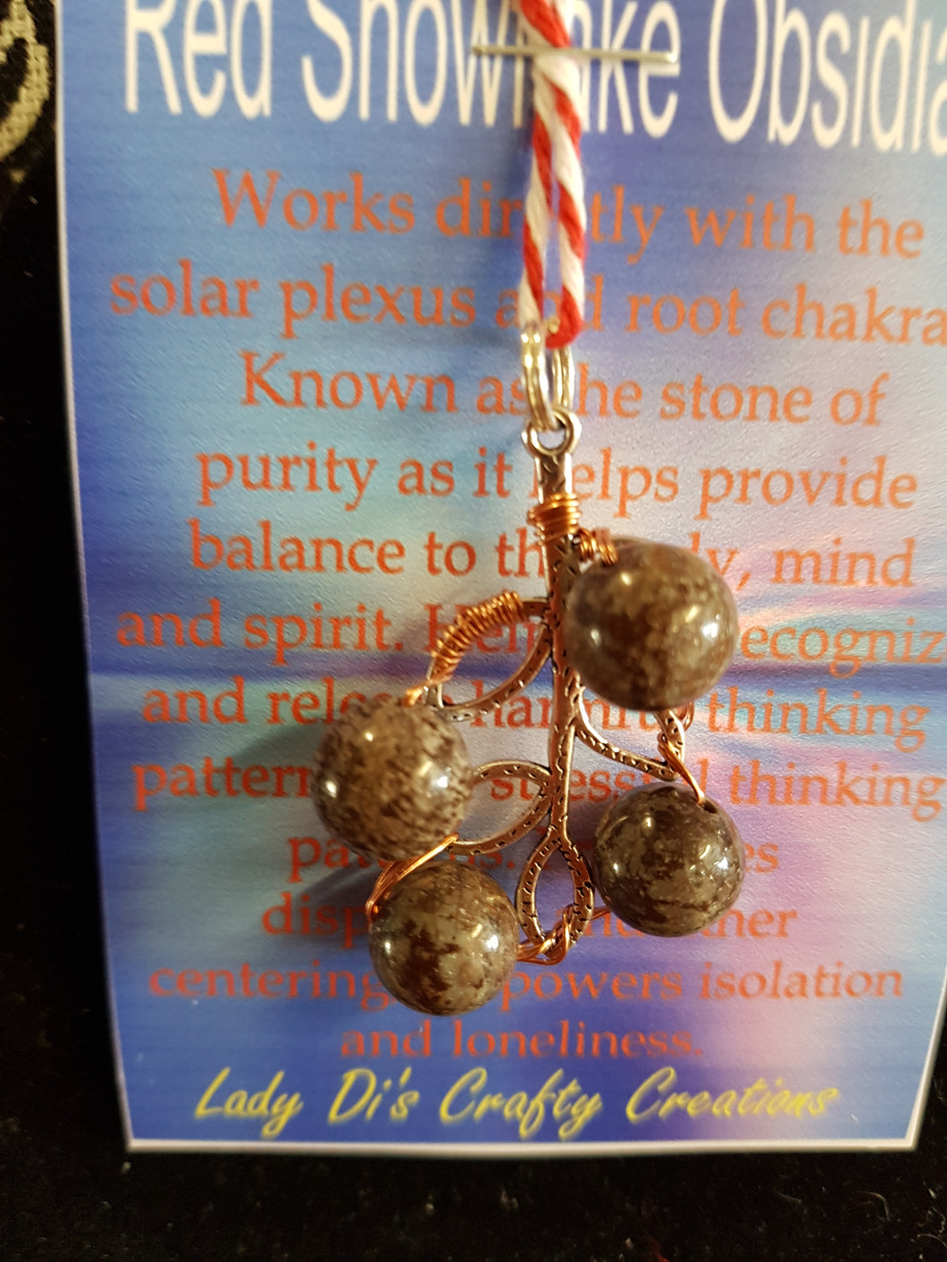 Red Snowflake Obsidian Pendant